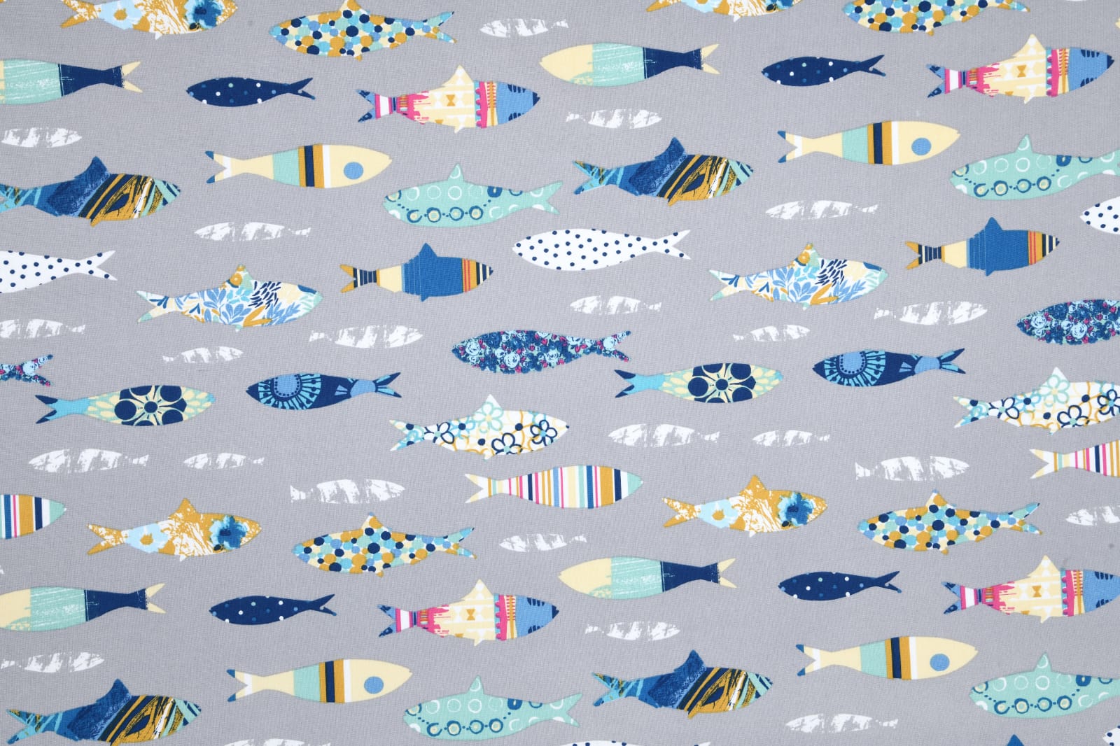 beschichtete Baumwolle / Wachstuchstück |  bunte Fische | grau