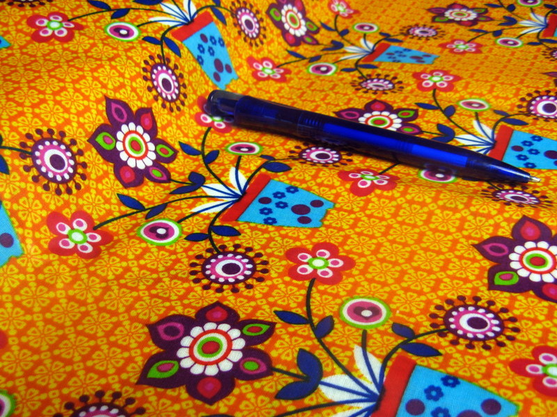 beschichtete Baumwolle / Wachstuchstück | Blumentopffreunde | gelb-orange