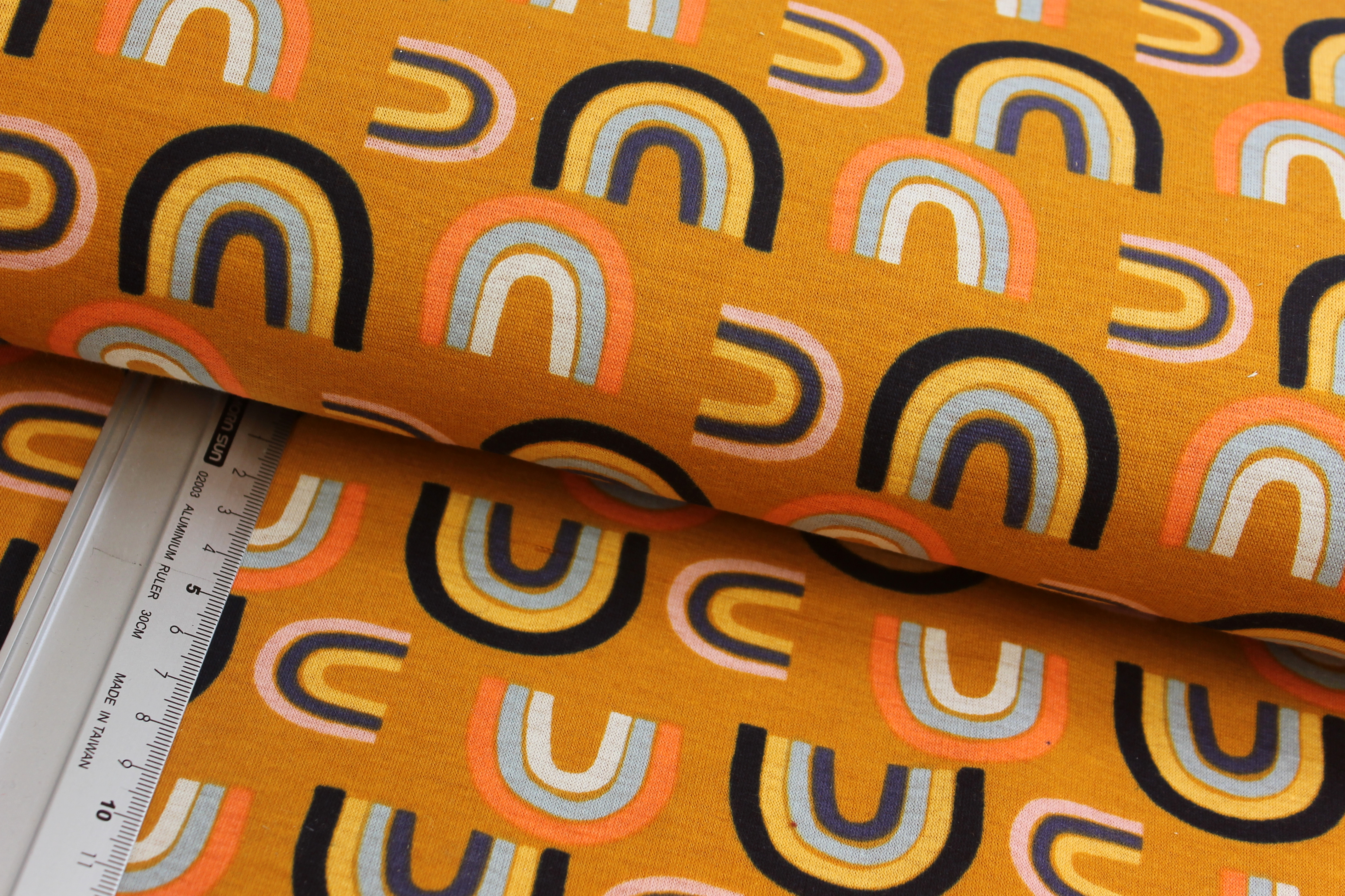 Alpenfleece | Regenbogen | curry